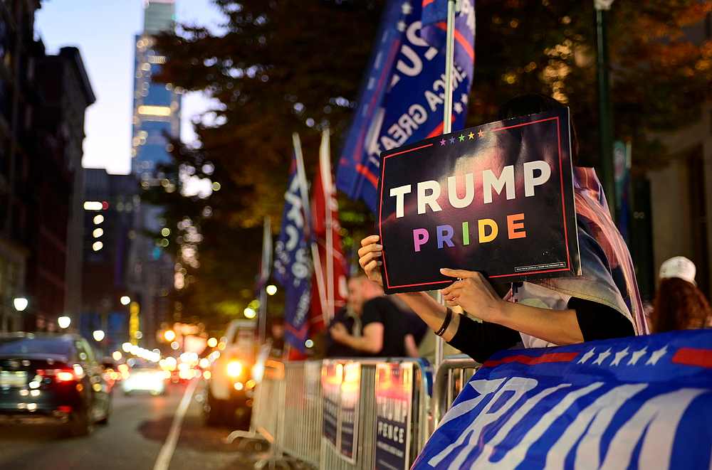 A supporter of US President Donald Trump holds up a 'Trump Pride' sign during a rally outside the Pennsylvania Convention Centre six days after the election in Philadelphia, Pennsylvania November 9, 2020. u00e2u20acu201d Reuters pic