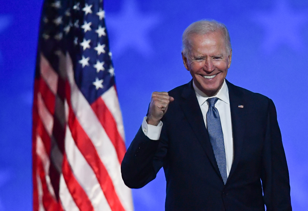 Democratic presidential nominee Joe Biden gestures after speaking during election night at the Chase Center in Wilmington, Delaware, early November 4, 2020. u00e2u20acu201d AFP pic