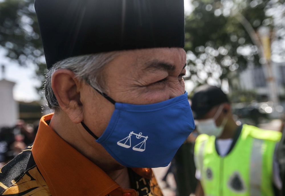 Umno President Datuk Seri Ahmad Zahid Hamidi is seen as he leaves Istana Kinta in Ipoh December 6, 2020. u00e2u20acu201d Picture by Farhan Najib