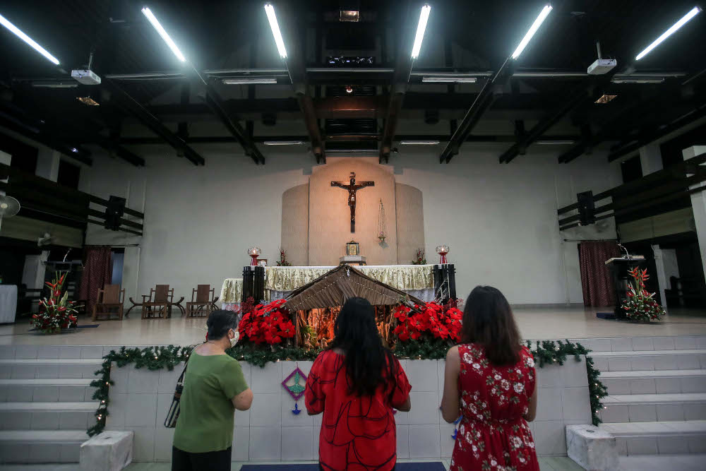 Christians attend a mass at the Church Of Our Mother Of Perpetual Help, Ipoh with strict standard operating procedures (SOP) to avoid the spread of Covid-19 December 25, 2020. u00e2u20acu201d Picture by Farhan Najib