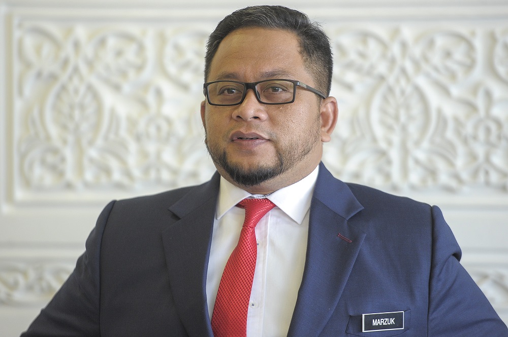 Deputy Minister in the Prime Minister's Department in charge of Religious Affairs Ahmad Marzuk Shaary speaks to reporters in Putrajaya, December 30, 2020. u00e2u20acu2022 Picture by Shafwan Zaidon
