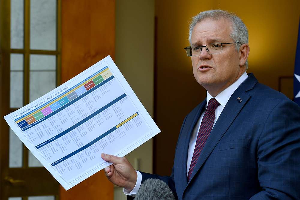 Australian Prime Minister Scott Morrison speaks at a press conference as the Covid-19 outbreak eases around the country, at Parliament House in Canberra, Australia November 13, 2020. u00e2u20acu201d AAP Image via Reuters pic