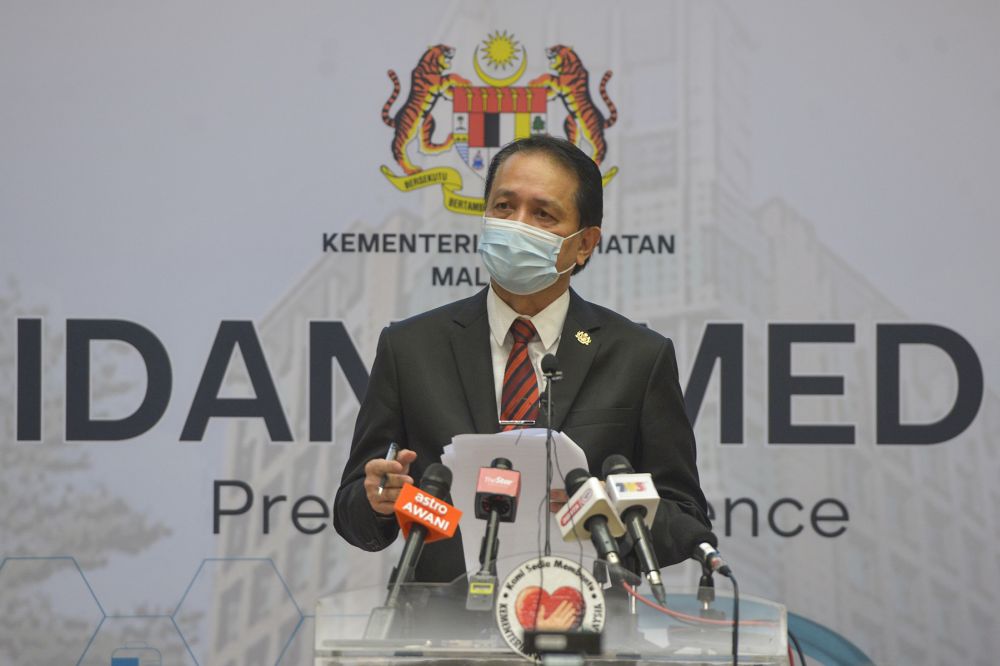 Health director-general Tan Sri Dr Noor Hisham Abdullah speaks during a press conference in Putrajaya on December 9, 2020. u00e2u20acu201d Picture by Miera Zulyana