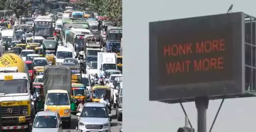 红绿灯上方还有警告字眼，写着“Honk More Wait More”（鸣笛越久等越久）。-图摘自网络-