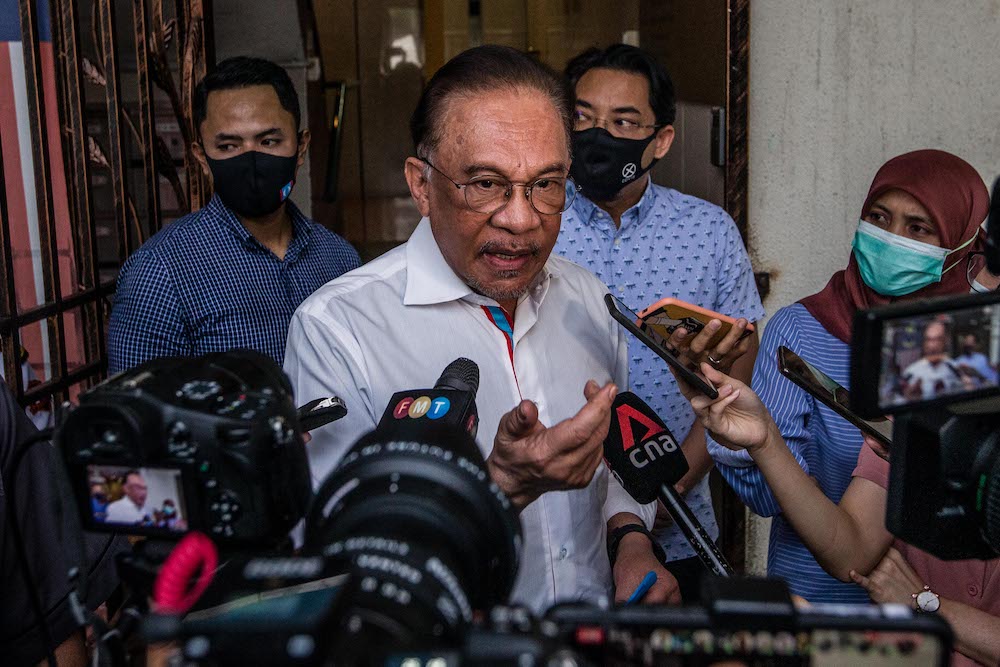 PKR president Datuk Seri Anwar Ibrahim speaks to reporters after meeting with the Pakatan Harapan presidential council in Petaling Jaya January 12, 2021. u00e2u20acu201d Picture by Firdaus Latif