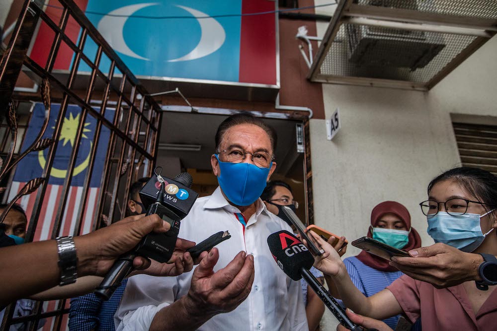 PKR president Datuk Seri Anwar Ibrahim speaks to reporters after meeting with the Pakatan Harapan presidential council in Petaling Jaya January 12, 2021. u00e2u20acu201d Picture by Firdaus Latif