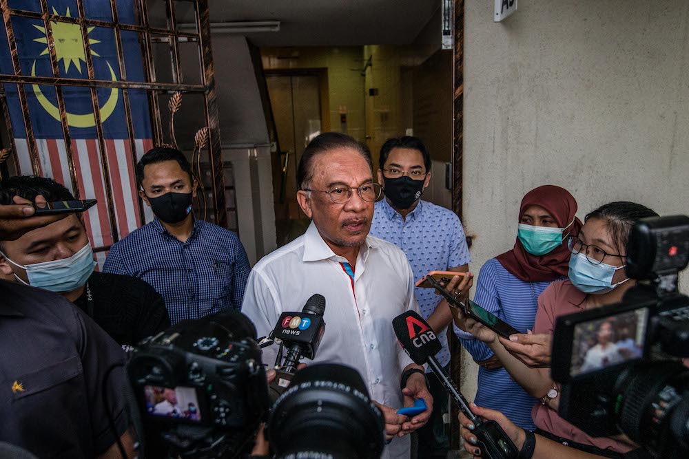 PKR president Datuk Seri Anwar Ibrahim speaks to reporters after meeting with the Pakatan Harapan presidential council in Petaling Jaya January 12, 2021. u00e2u20acu201d Picture by Firdaus Latif