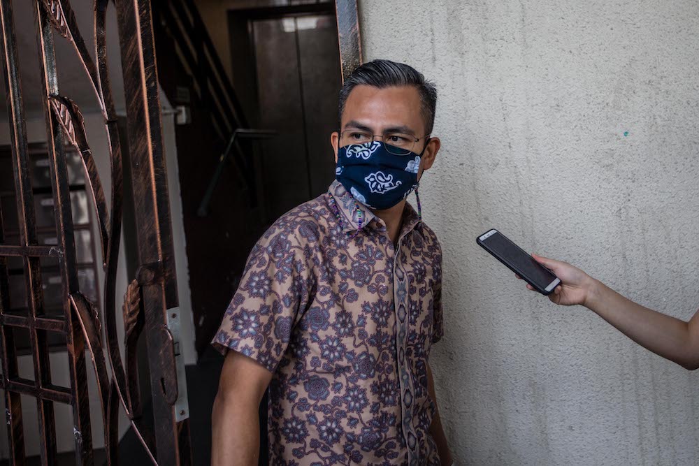 PKR communications director Fahmi Fadzil speaks to reporters after meeting with the Pakatan Harapan presidential council in Petaling Jaya January 12, 2021. u00e2u20acu201d Picture by Firdaus Latif