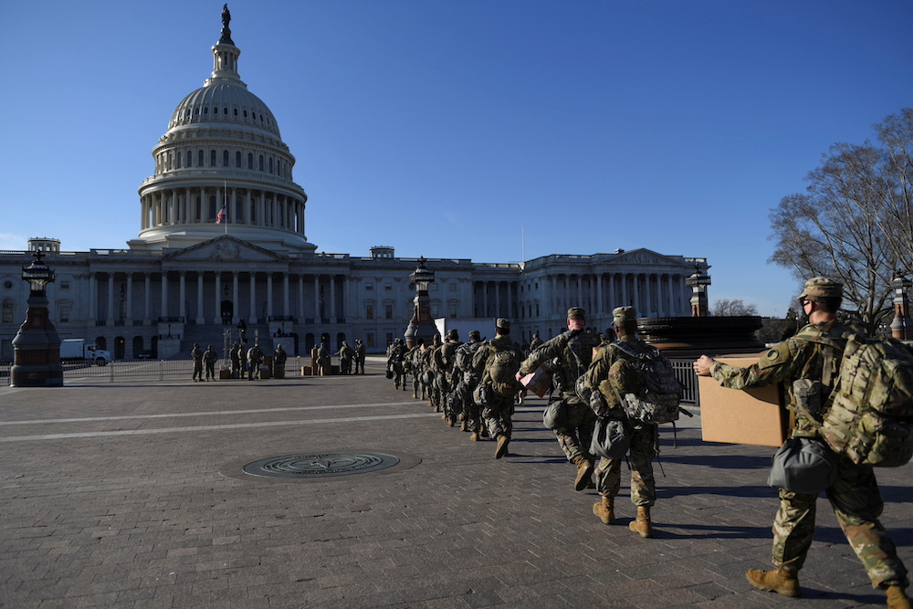 National Guard members deploy on US Capitol grounds, after US President Donald Trump was impeached for a second time, in Washington January 14, 2021. u00e2u20acu201d Reutesr pic