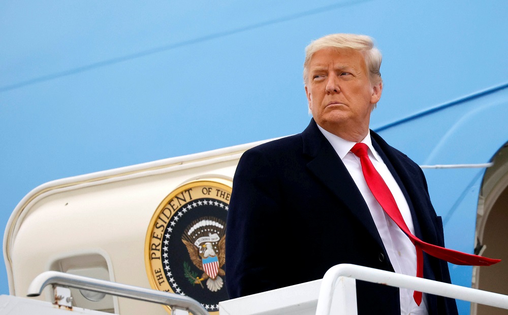 US President Donald Trump boards Air Force One at Valley International Airport after visiting the US-Mexico border wall, in Harlingen, Texas January 12, 2021. u00e2u20acu201d Reuters pic