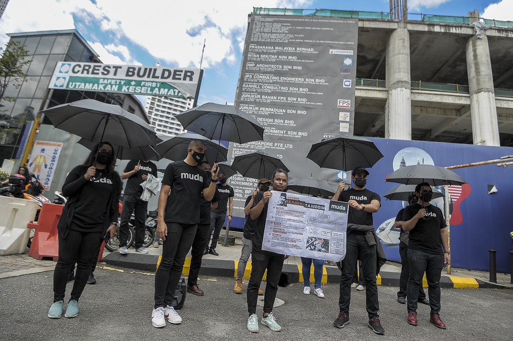 MUDA members pose for a photo during a press conference at the Dang Wangi LRT station in Kuala Lumpur, January 5, 2020. u00e2u20acu201d Picture by Shafwan Zaidon