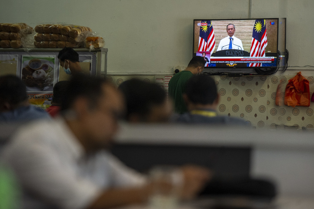 The live telecast of Prime Minister Tan Sri Muhyiddin Yassin speech about the movement control order in Kajang January 11, 2020. u00e2u20acu201d Picture by Shafwan Zaidon