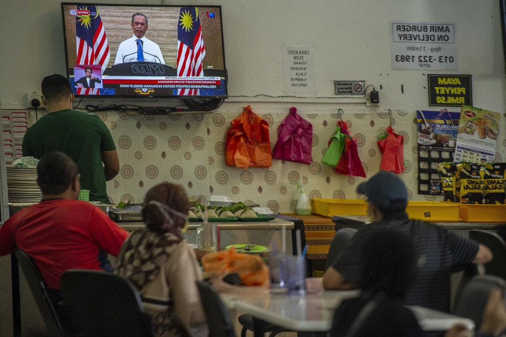 The live telecast of Prime Minister Tan Sri Muhyiddin Yassin speech about the movement control order in Kajang January 11, 2020. u00e2u20acu201d Picture by Shafwan Zaidon