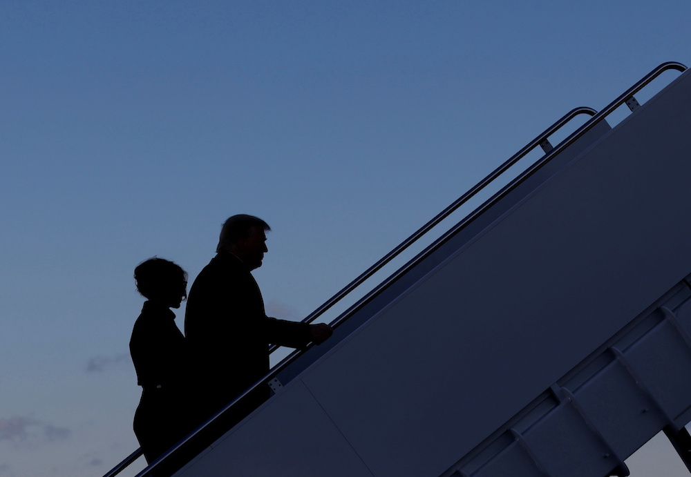 US President Donald Trump departs next to first lady Melania Trump from the Joint Base Andrews, Maryland, January 20, 2021. u00e2u20acu201d Reuters picn n