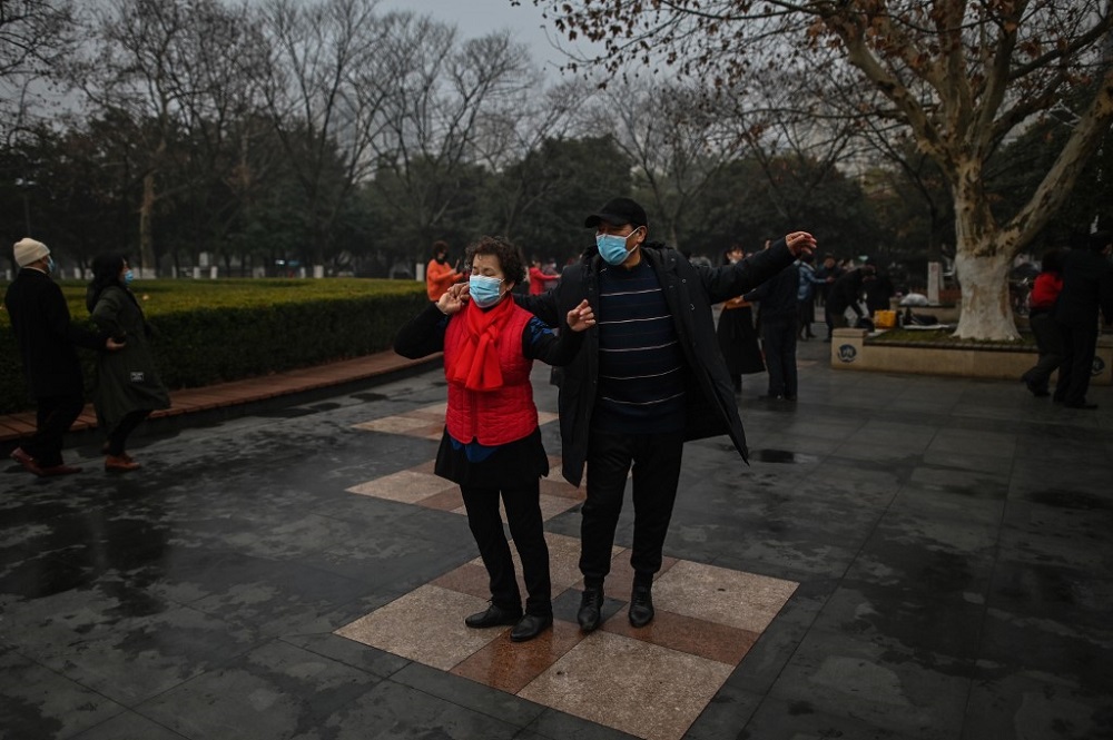 A couple dance in a park in Wuhan, Chinau00e2u20acu2122s central Hubei province on January 23, 2021, one year after the city went into lockdown to curb the spread of the Covid-19 coronavirus. u00e2u20acu201d AFP pic
