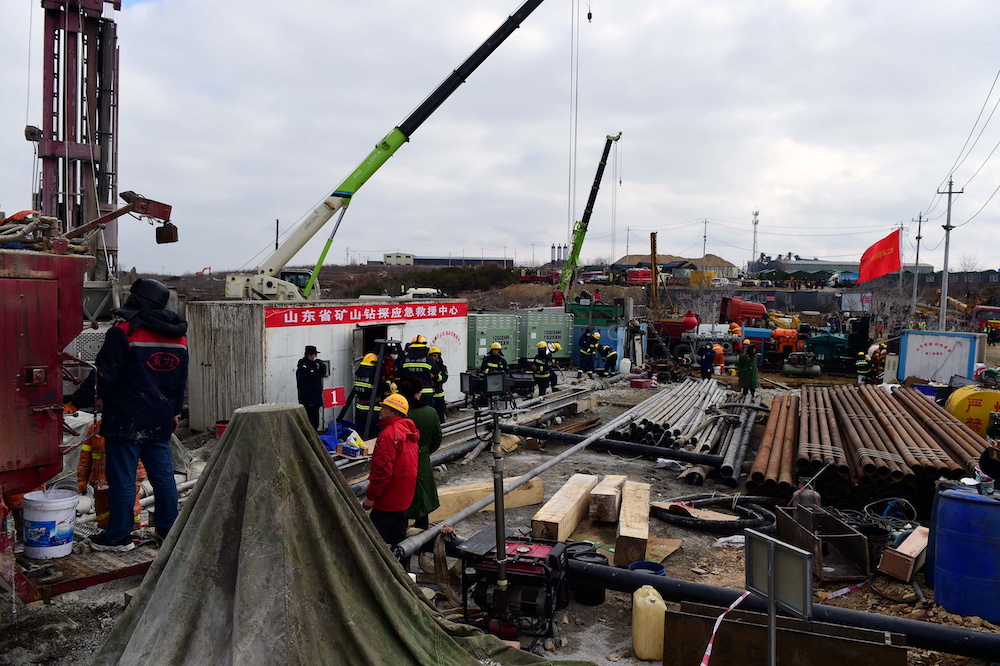 Rescuers work on saving workers trapped underground after the January 10 explosion at the Hushan gold mine in Qixia, Shandong province, China January 20, 2021. u00e2u20acu201d cnsphoto via Reuters