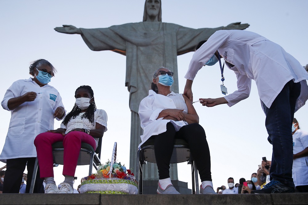 Dulcineia da Silva Lopes receives the Sinovac coronavirus disease vaccine at Christ the Redeemer statue in Rio de Janeiro January 18, 2021. u00e2u20acu2022 Reuters pic