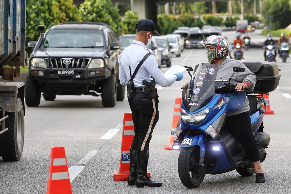 Police man a roadblock along Jalan Syed Putra in Kuala Lumpur January 13, 2021. u00e2u20acu2022 Picture by Choo Choy May