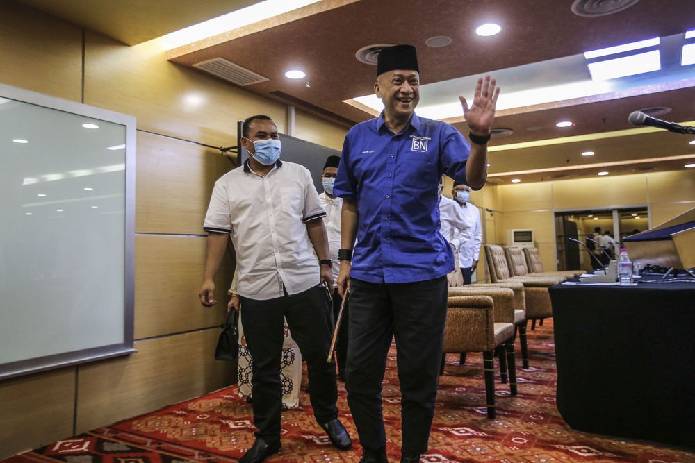 Datuk Seri Mohamed Nazri Abdul Aziz waves at reporters after a press conference at the Putra World Trade Centre, Kuala Lumpur January 12, 2021. u00e2u20acu201dPicture by Hari Anggara