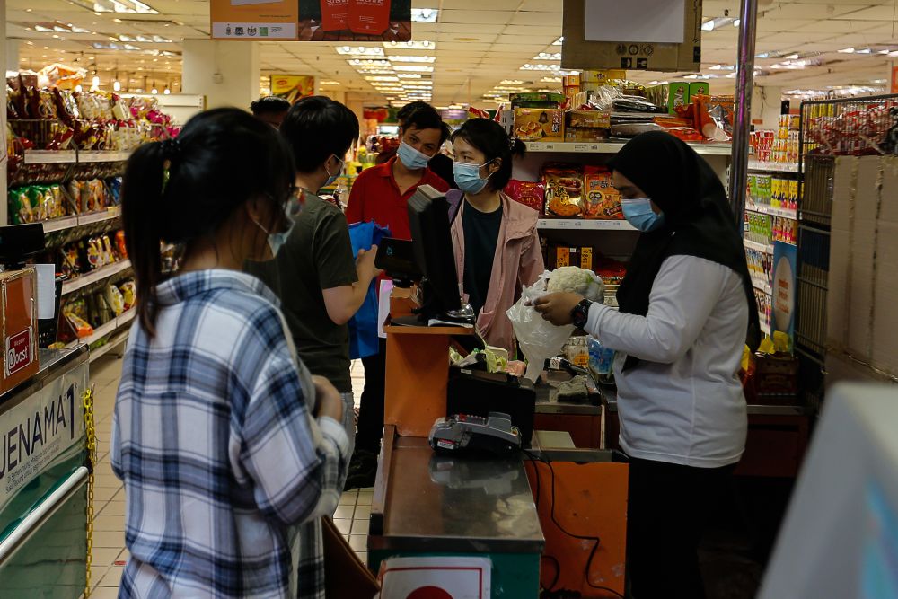 People are seen calmly shopping for provisions on the eve of MCO 2.0 here at a supermarket in Bayan Baru January 12, 2021. u00e2u20acu201d Picture by Sayuti Zainudin