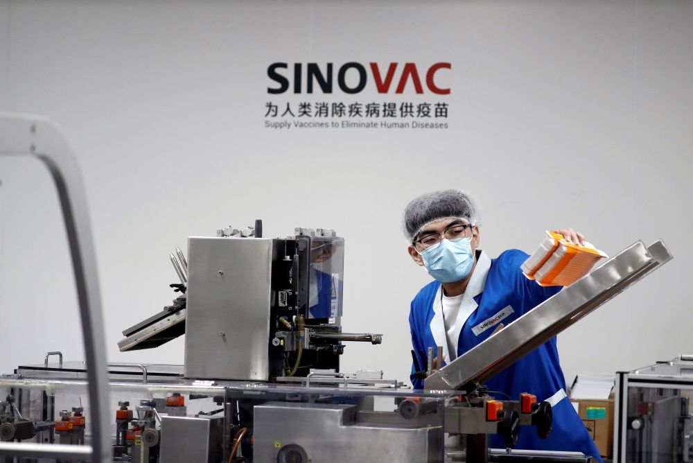 A man works in the packaging facility of Chinese vaccine maker Sinovac Biotech n Beijing September 24, 2020. u00e2u20acu201d Reuters pic