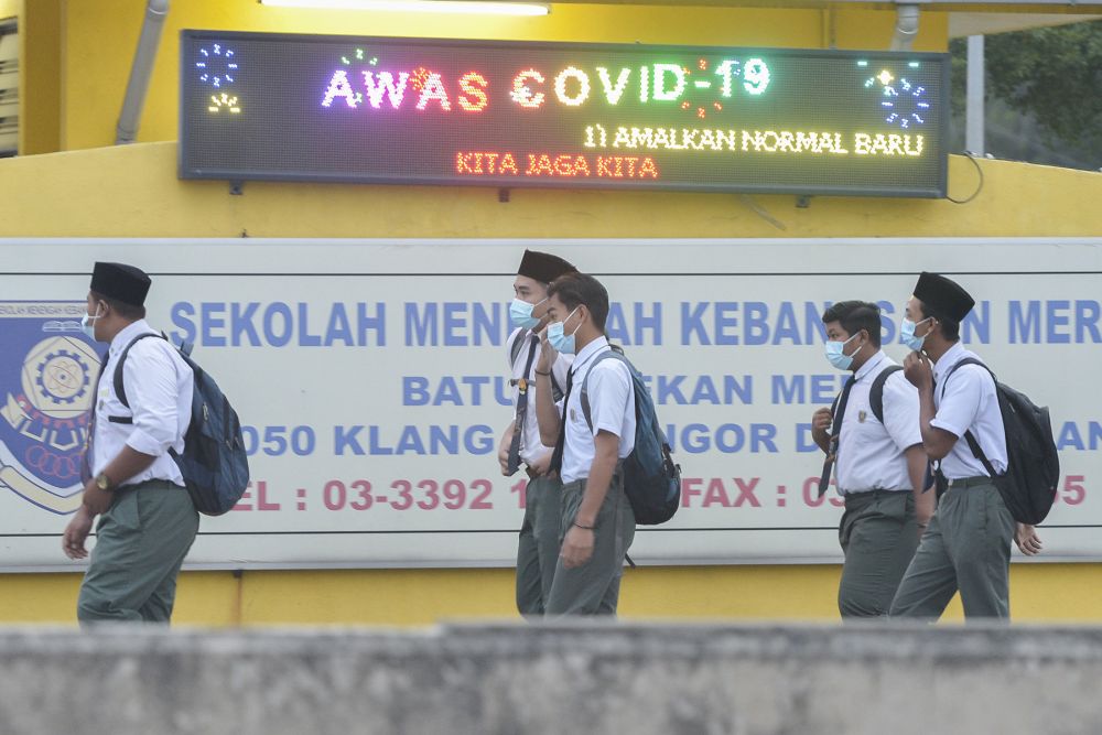Sekolah Menengah Kebangsaan Meru students who are taking the SPM examination return to school amid the movement control order January 20, 2021. u00e2u20acu201d Picture by Miera Zulyanann