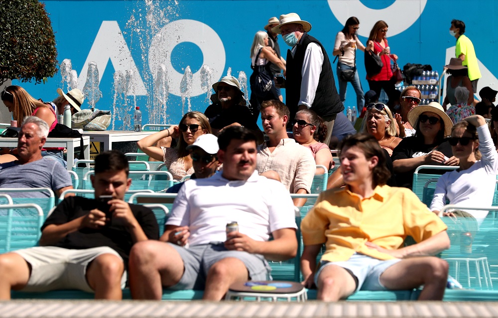 Fans relax at Melbourne Park during the Australian Open in Melbourne February 12, 2021. u00e2u20acu201d Reuters pic