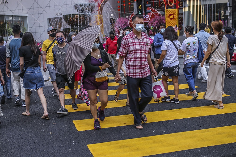 People were face masks during the movement control order, in Kuala Lumpur city centre February 16, 2021. u00e2u20acu201d Picture by Hari Anggara