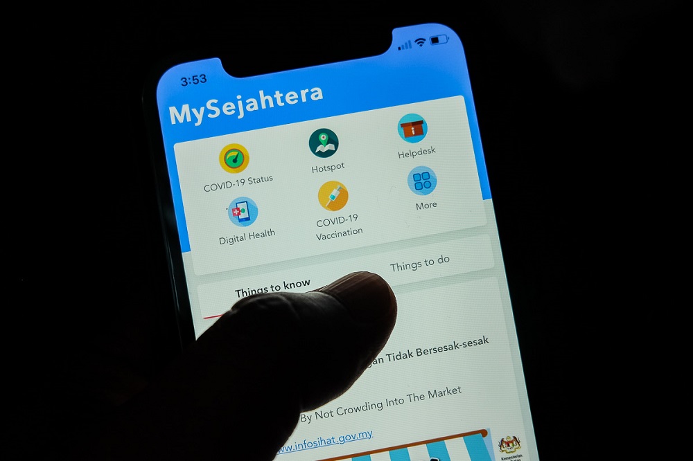The section for Covid-19 vaccination registration via the MySejahtera mobile application is displayed on a mobile phone in Kuala Lumpur February 23, 2021. u00e2u20acu201dPicture by Yusof Mat Isa