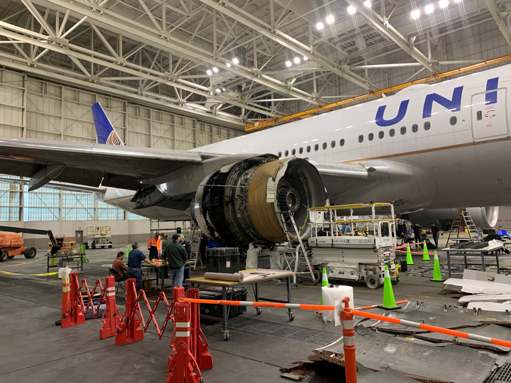 The damaged starboard engine of United Airlines flight 328, a Boeing 777-200, is seen in a hangar at Denver International Airport, Colorado, US, February 22, 2021. u00e2u20acu201d National Transportation Safety Board handout pic via Reuters 