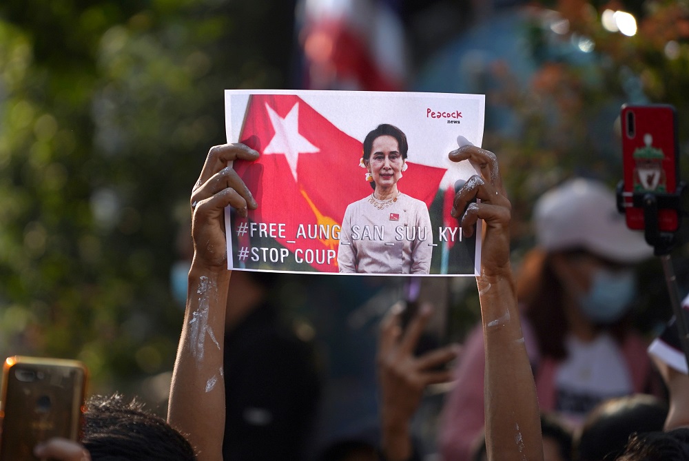 NLD supporter holds up a picture of party co-founder Aung San Suu Kyi outside Myanmar's embassy after the military seized power from a democratically elected civilian government and arrested her, in Bangkok February 1, 2021. u00e2u20acu2022 Reuters pic