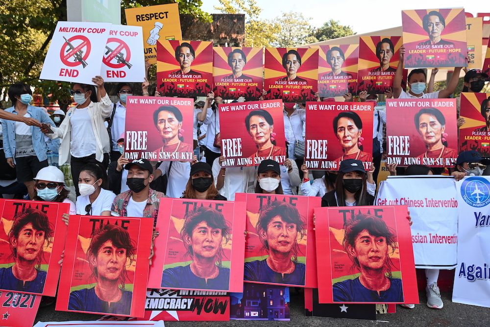 Demonstrators hold up signs during a protest against the military coup and demanding the release of elected leader Aung San Suu Kyi, in Yangon, Myanmar, February 13, 2021. u00e2u20acu201d Reuters picnnnn