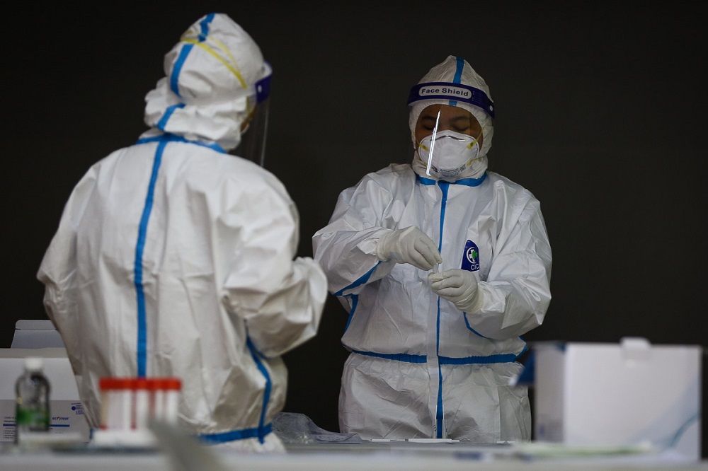 Health workers collect swab samples to test for Covid-19 at Dewan MBPJ in Petaling Jaya February 6, 2021. u00e2u20acu201d Picture by Yusof Mat Isa