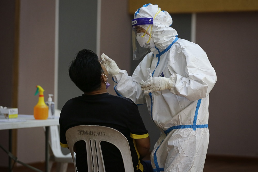 Health workers collect swab samples to test for Covid-19 at Dewan MBPJ in Petaling Jaya February 6, 2021. u00e2u20acu201d Picture by Yusof Mat Isa