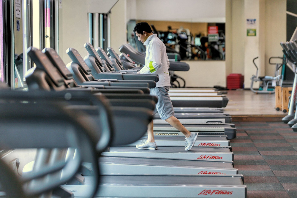 Gym-goers working out at Enrich Fitness centre in Ampang February 12, 2021. u00e2u20acu201d Picture by Ahmad Zamzahuri
