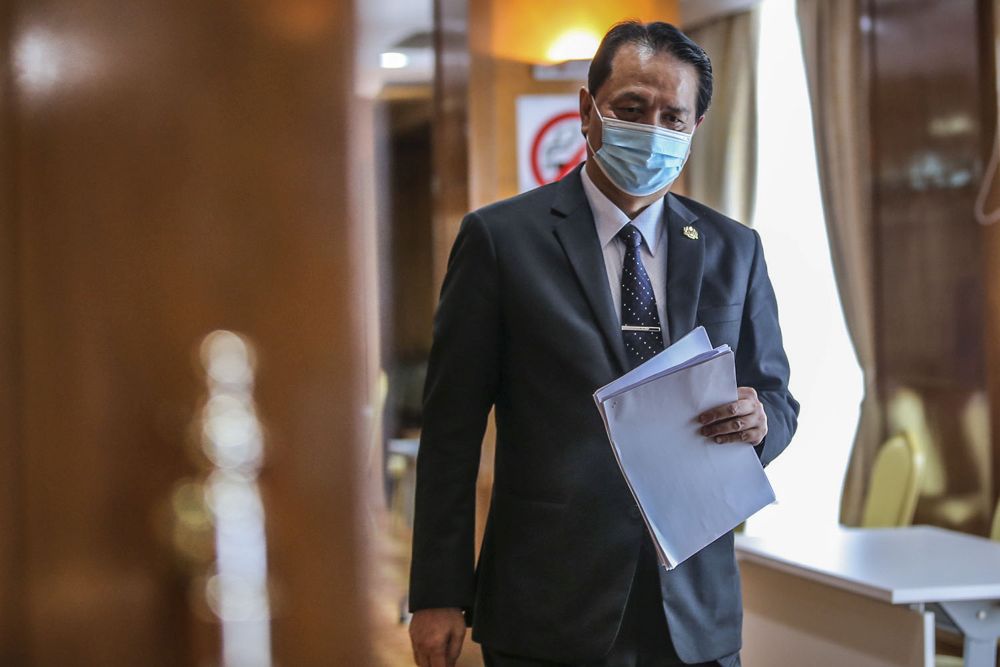 Health director-general Tan Sri Dr Noor Hisham Abdullah arrives for his daily press conference on Covid-19 in Putrajaya February 9, 2021. u00e2u20acu201d Picture by Hari Anggarann