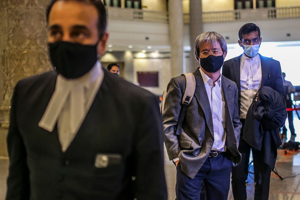 Malaysiakini editor-in-chief Steven Gan arrives at the Federal Court in Putrajaya February 19, 2021. u00e2u20acu2022 Picture by Hari Anggara