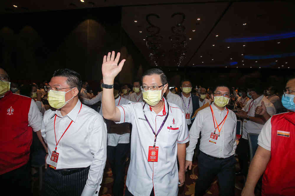 Dap Secretary General Lim Guan Eng waves as he arrives for the Perak DAP party convention at Ipoh Convention Centre, March 14, 2021. u00e2u20acu201d Picture by Farhan Najib