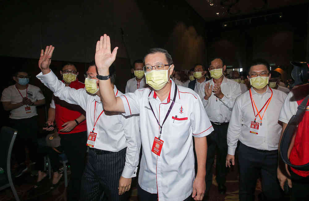 Dap Secretary General Lim Guan Eng waves as he arrives for the Perak DAP party convention at Ipoh Convention Centre, March 14, 2021. u00e2u20acu201d Picture by Farhan Najib