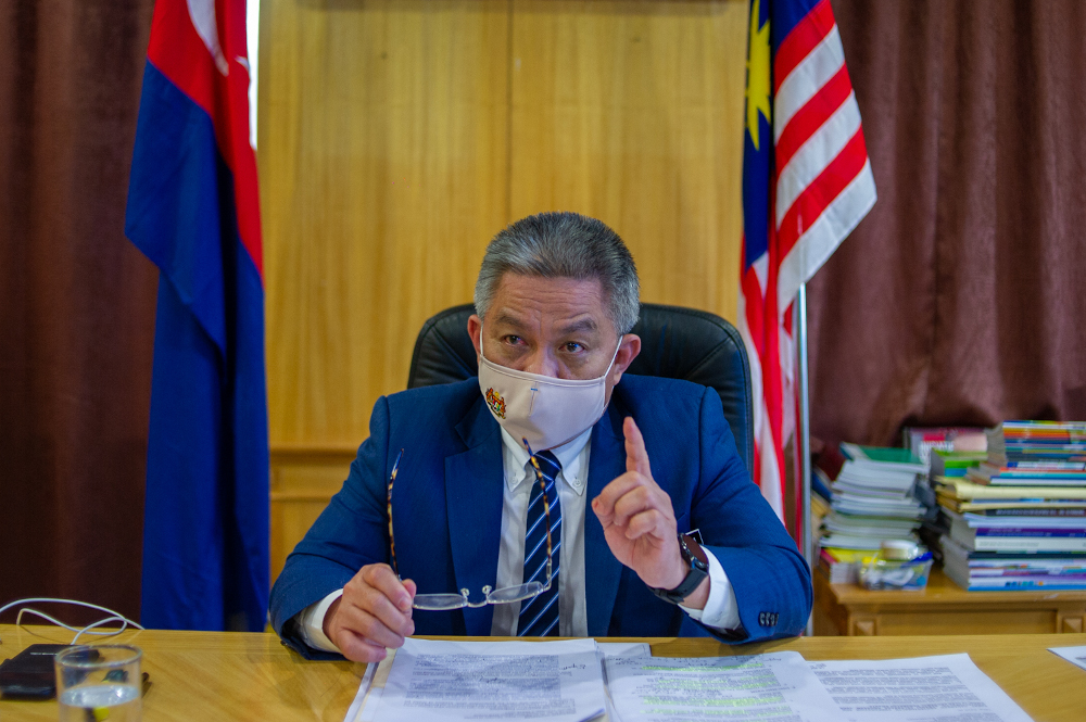 Health minister Datuk Seri Dr Adham Baba speaks to a reporter during an interview session with Malay Mail at the Ministry of Health in Putrajaya, March 4, 2021. u00e2u20acu201d Picture by Shafwan Zaidon 