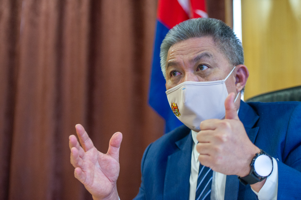 Health minister Datuk Seri Dr Adham Baba speaks to a reporter during an interview session with Malay Mail at the Ministry of Health in Putrajaya, March 4, 2021. u00e2u20acu201d Picture by Shafwan Zaidon 