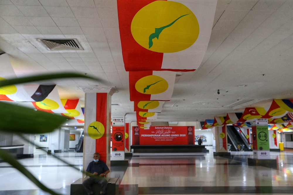 Umno party flags are seen during preparations for the Umno annual general meeting in PWTC, Kuala Lumpur March 25, 2021. u00e2u20acu201d Picture by Ahmad Zamzahuri