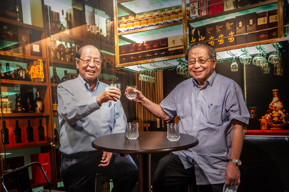 Gelang Patah MP, Lim Kit Siang poses with an art piece of himself at the art exhibition celebrating his life in Bukit Jalil March 30, 2021. u00e2u20acu201d Picture by Shafwan Zaidon