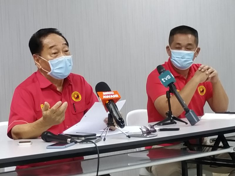 Parti Sarawak Bersatu president Datuk Sri Wong Soon Koh (left), seen with Batu Lintang assemblyman See Chee How, speaks during a press conference March 9, 2021. u00e2u20acu201d Picture by Sulok Tawienn