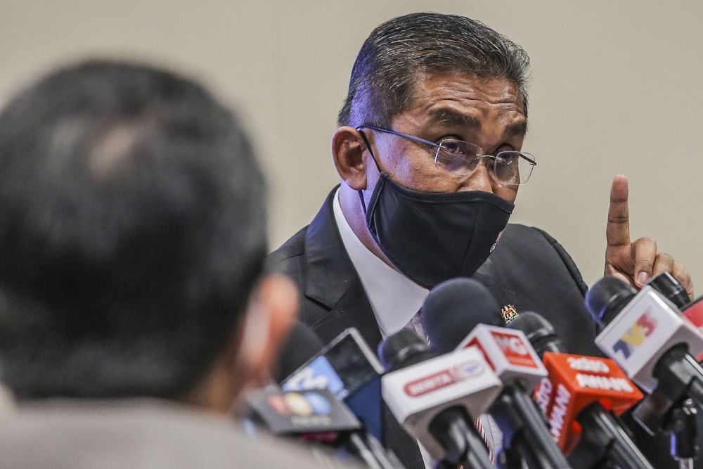 Datuk Seri Takiyuddin Hassan speaks during a press conference on the Emergency Ordinance in Putrajaya March 12, 2021. u00e2u20acu201d Picture by Hari Anggara