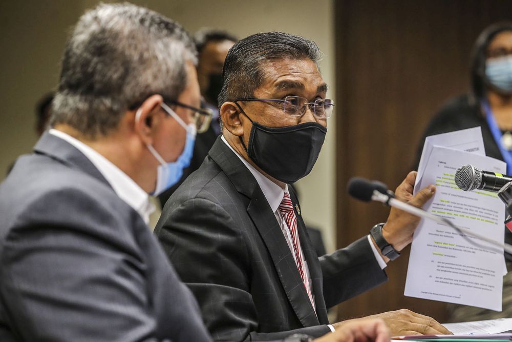 Datuk Seri Takiyuddin Hassan speaks during a press conference on the Emergency Ordinance in Putrajaya March 12, 2021. u00e2u20acu201d Picture by Hari Anggara