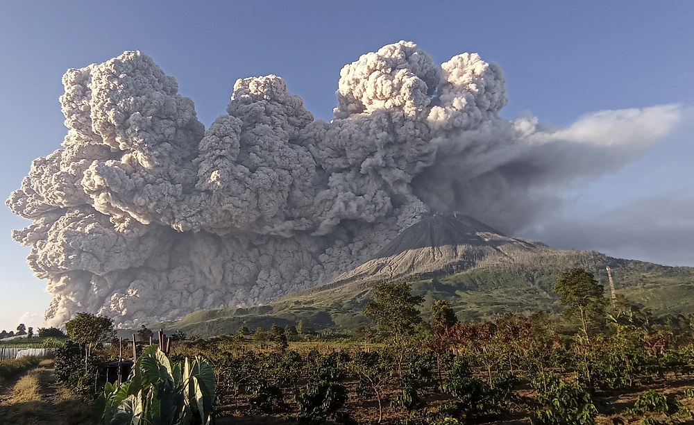 Mount Sinabung volcano erupts as seen from Kuta Rakyat village in Karo, North Sumatra Province, Indonesia March 2, 2021, in this photo taken by Antara Foto. u00e2u20acu2022 Handout via Reuters