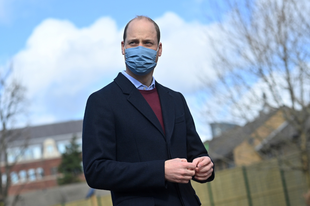 Britainu00e2u20acu2122s Prince William reacts to a question from the media as he leaves from a visit to the School 21 following its re-opening after the easing of Covid-19 lockdown restrictions in east London March 11, 2021. u00e2u20acu201d Justin Tallis/Pool pic via Reuters