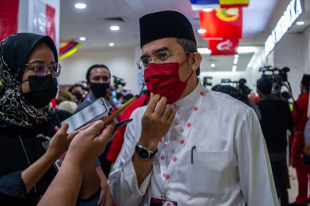 Umno Youth chief Datuk Asyraf Wajdi Dusuki speaks to reporters during the partyu00e2u20acu2122s general assembly in Kuala Lumpur March 28, 2021. u00e2u20acu201d Picture by Shafwan Zaidon