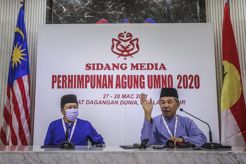 Umno deputy president Datuk Seri Mohamad Hassan (right) speaks during a press conference at the 2020 Umno annual general meeting in Kuala Lumpur March 27, 2021. u00e2u20acu2022 Picture by Hari Anggara